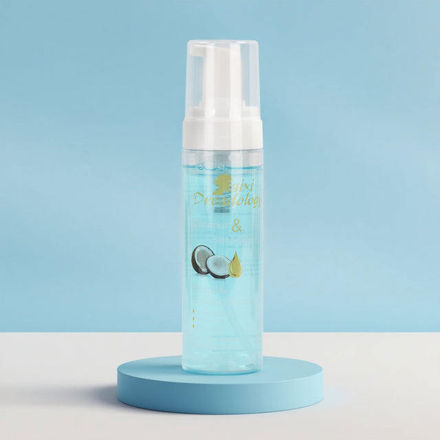 Daixidreadology Coconut & Shea Wrap Me mousse for defined curls.